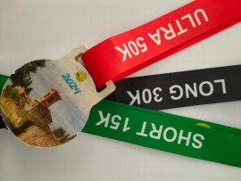 La medaglia della 2^ Crete Senesi Ultramarathon, quando l’artigianato incontra il territorio
